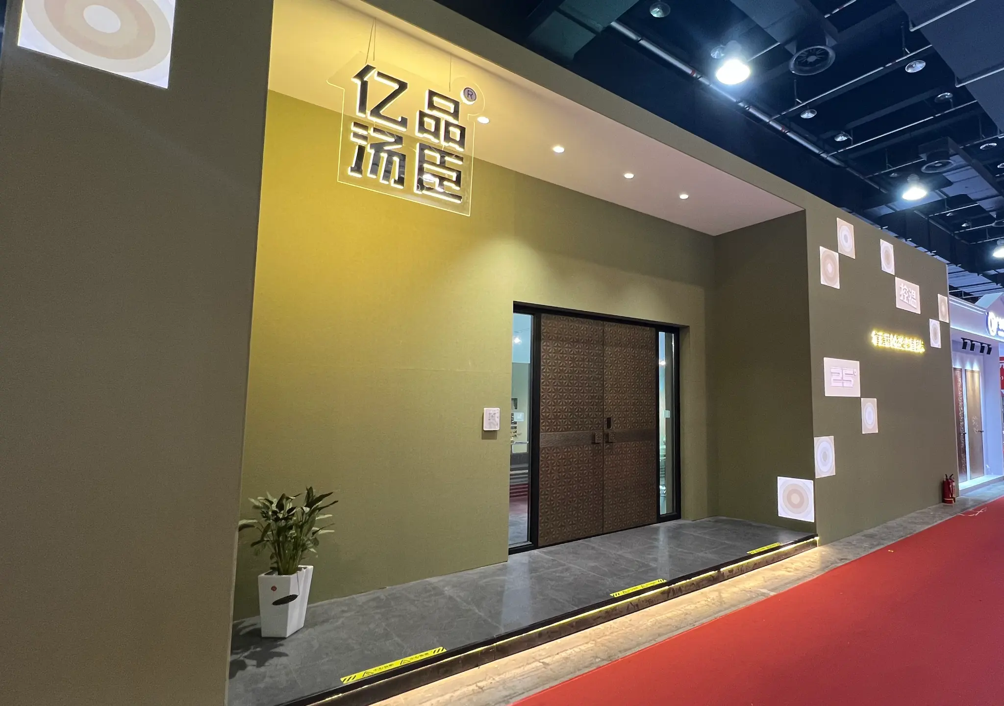 Completed EPIN TOMCIM entrance environment with coordinated door and architectural surfaces