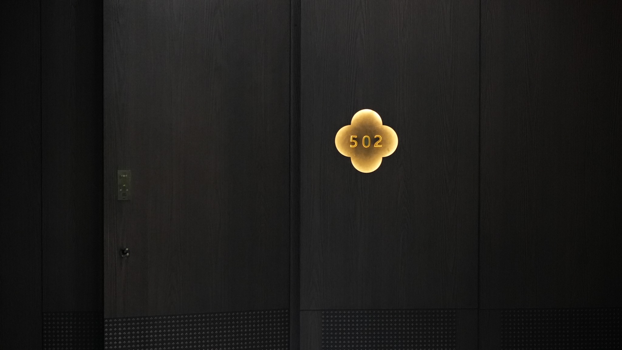 The 502 entrance displayed at full scale within the exhibition space