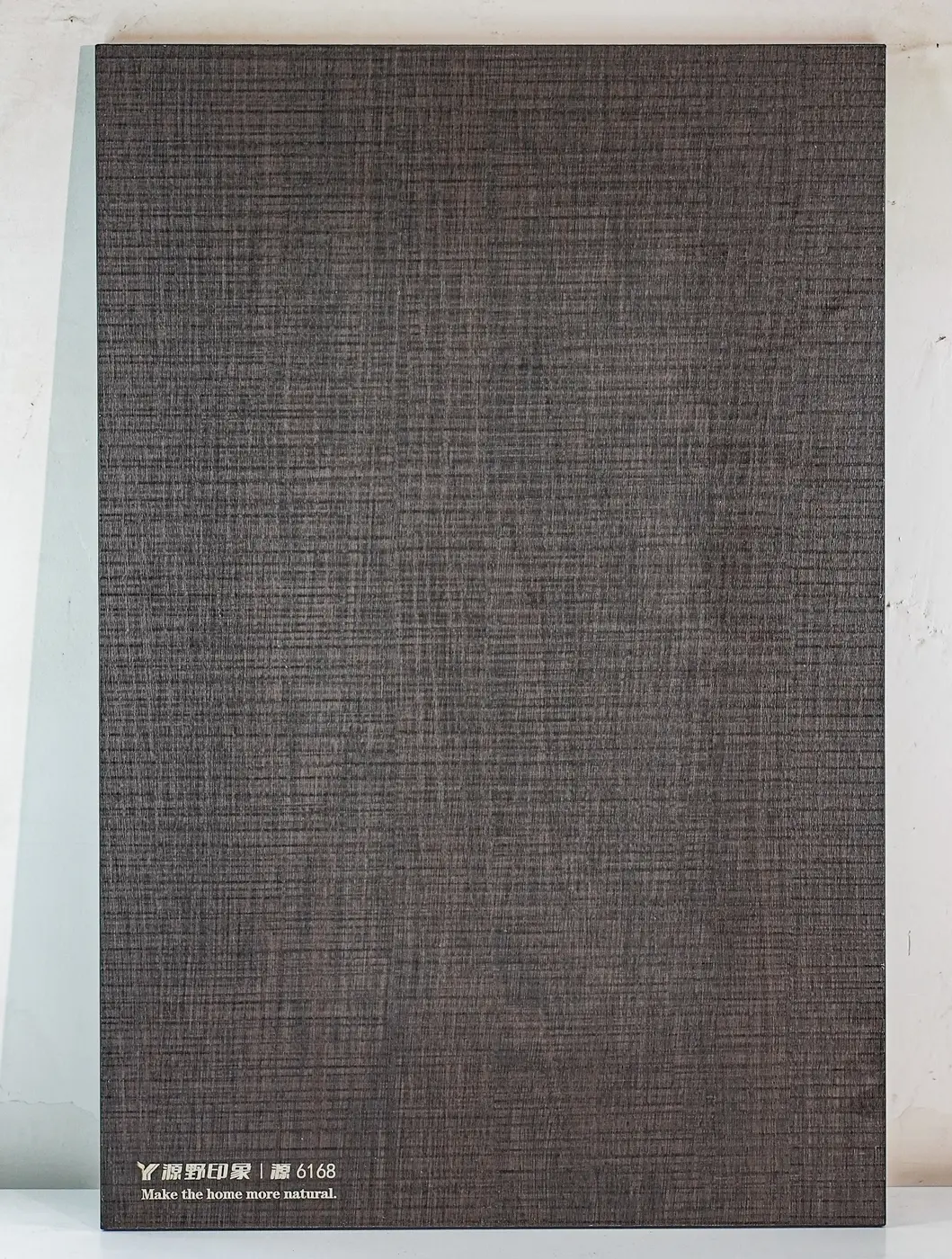 Woven bronze direction finish sample
